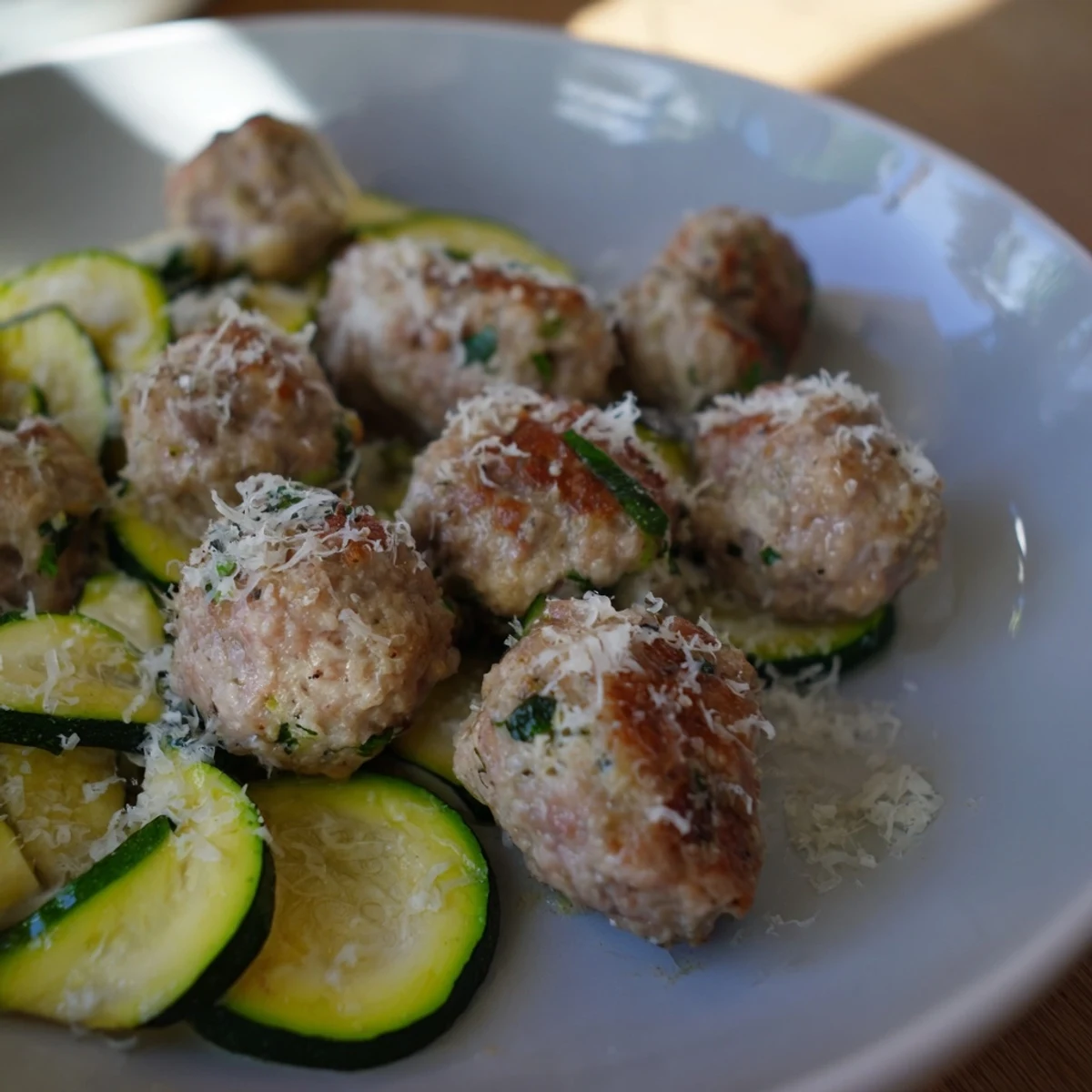 These Easy Sheet Pan Turkey Meatballs with Zucchini are served hot, perfect for a balanced weeknight dinner.