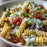 Easy Taco Pasta Salad for Summer Potlucks: A colorful mix of pasta, black beans, corn, and veggies tossed in creamy taco dressing.