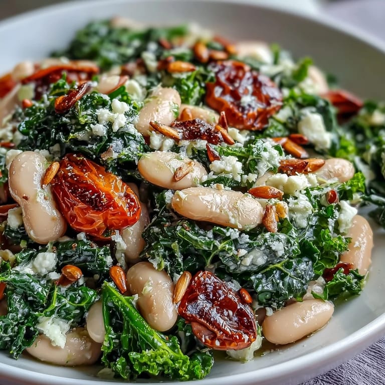 Crisp kale and creamy white beans highlight this vibrant, refreshing white bean and kale salad.